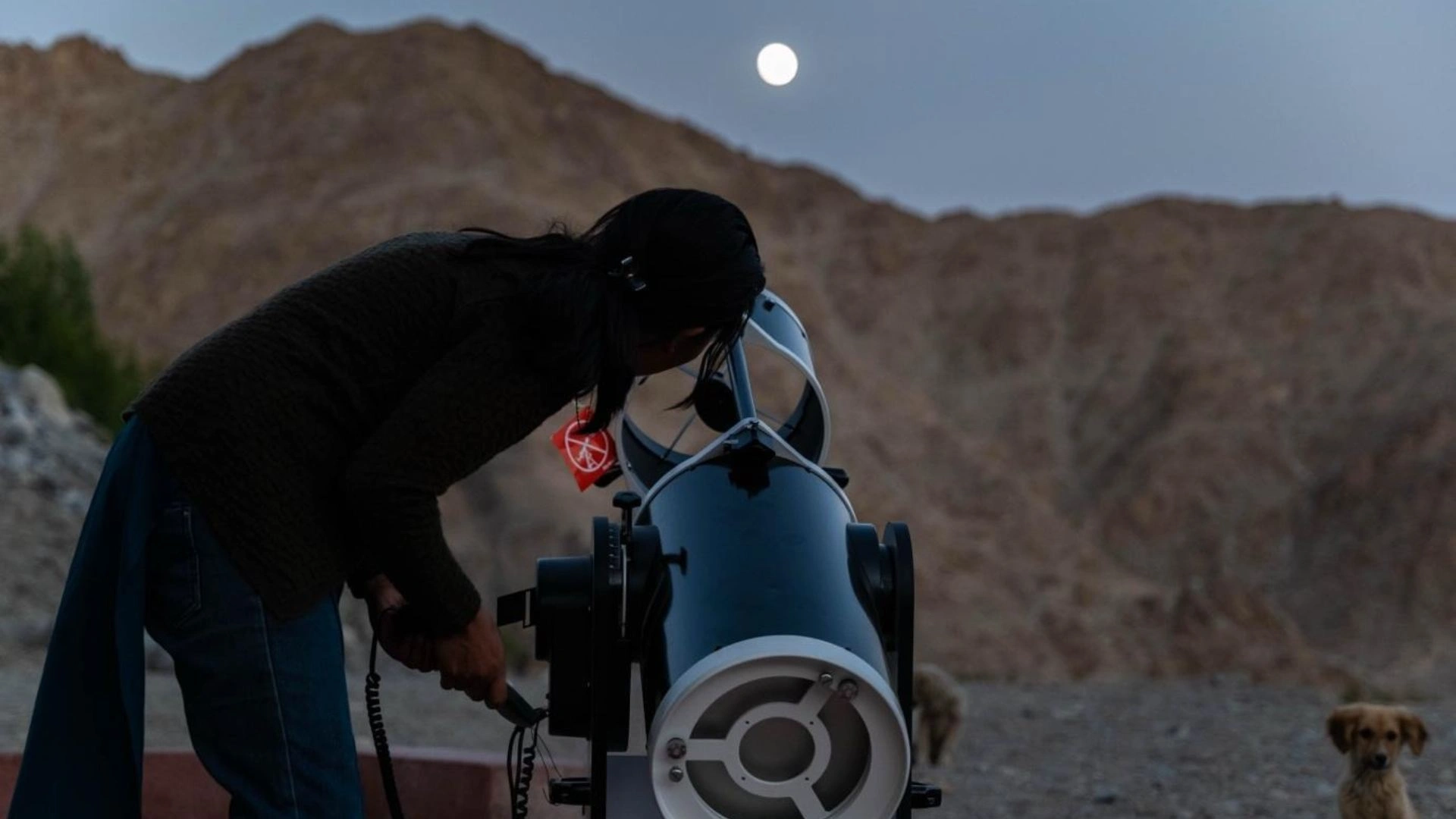 One of the team members aligning the telescope before guest arrival